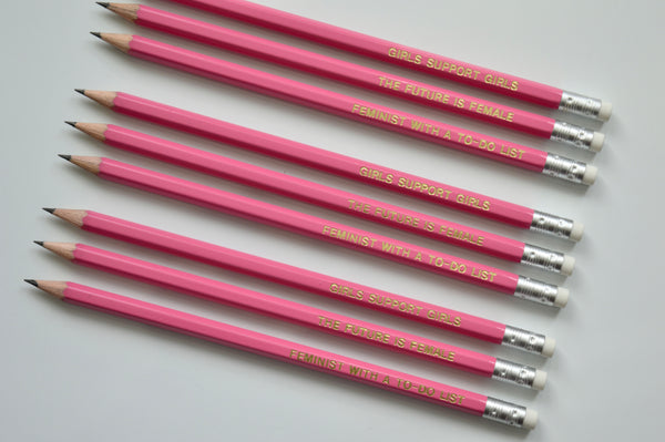 Gold Foiled feminist pencils reading: feminist with a to-do list, girls support girls, the future is female