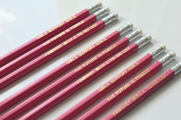 Gold Foiled feminist pencils reading: feminist with a to-do list, girls support girls, the future is female